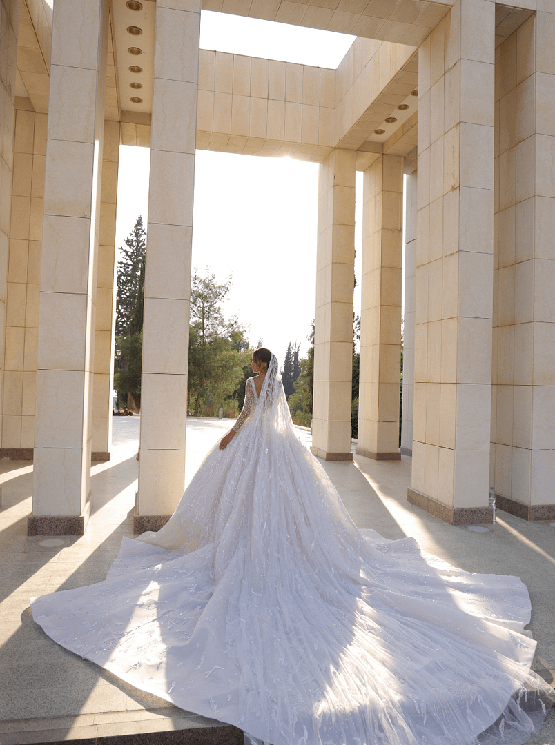 Off-white, long-trail, broad-pleated couture wedding dress
