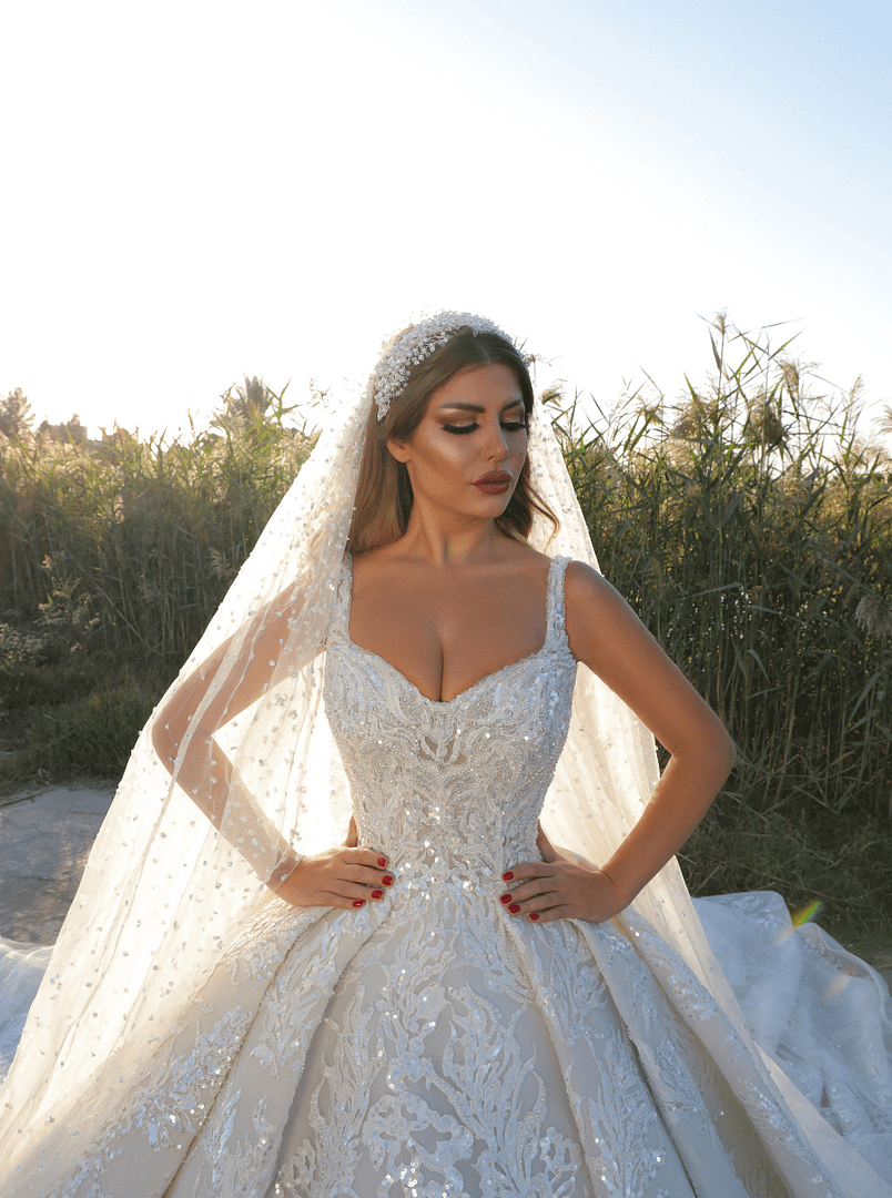 off-white sweetheart neck bridal gown